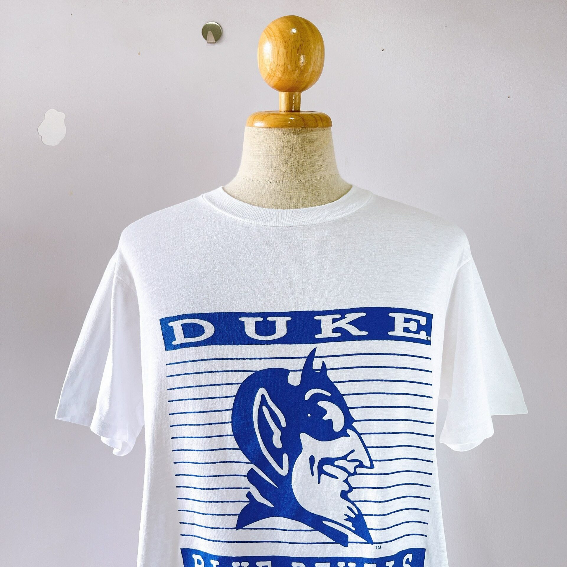 university blue dunks shirt