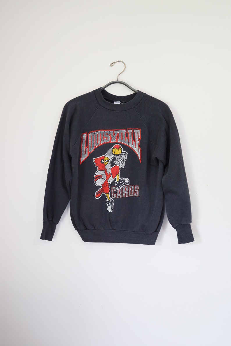 Vintage University Of Louisville Sweatshirt - Dusty Faded Black Raglan Graphic Sweatshirts - 80s College Sweatshirts