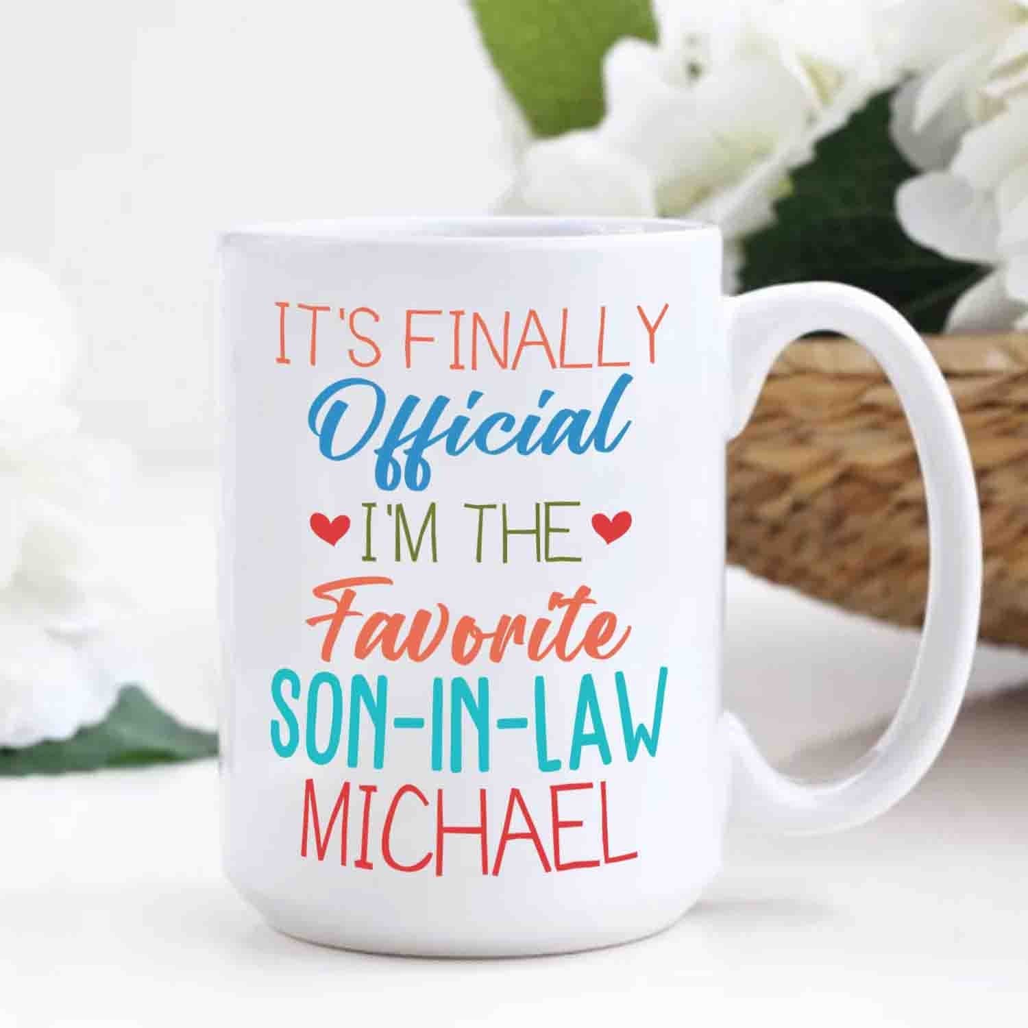 Personalized Son In Law White Coffee Mug, It's Finally Official I'm The Favourite Son In Law White Ceramic Mug 11 Oz 15 Oz, Choose Name Coffee Cup For Men Husband, Unique Son In Law Travel Mug Gifts