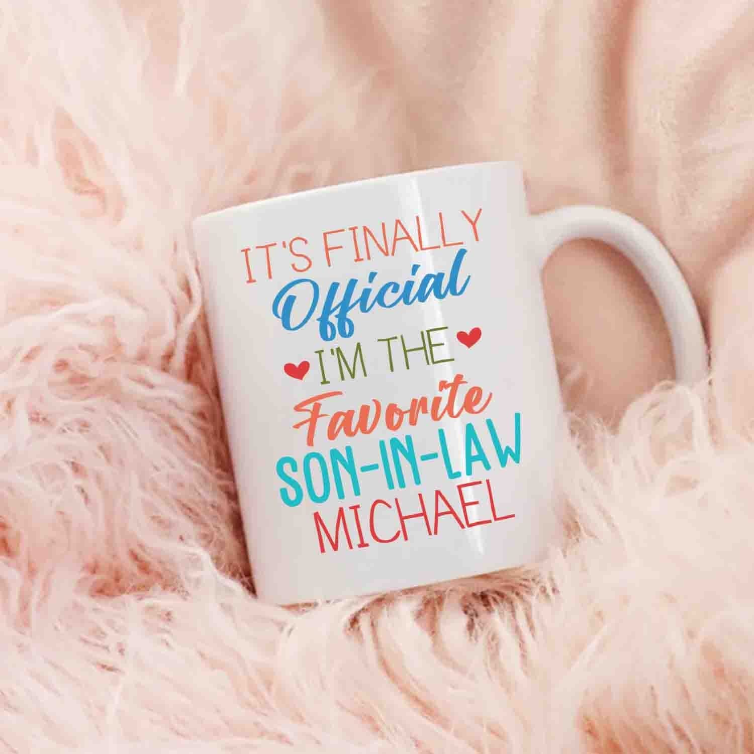 Personalized Son In Law White Coffee Mug, It's Finally Official I'm The Favourite Son In Law White Ceramic Mug 11 Oz 15 Oz, Choose Name Coffee Cup For Men Husband, Unique Son In Law Travel Mug Gifts
