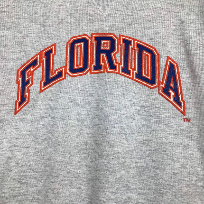 Vintage Style 90’s Russell Florida University Crewneck Sweatshirt Printed Spell Out Logo Florida Gators Sweater Pullover, Hoodie, Shirt Gifts for Fans