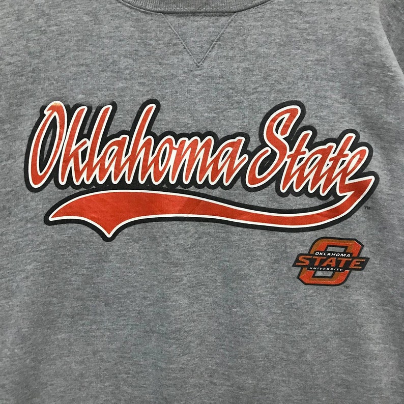 Vintage Style 90’s Starter OKLAHOMA STATE UNIVERSITY Printed Spell Out Crew Neck Sweatshirt, Hoodie, Shirt Gifts for Fans