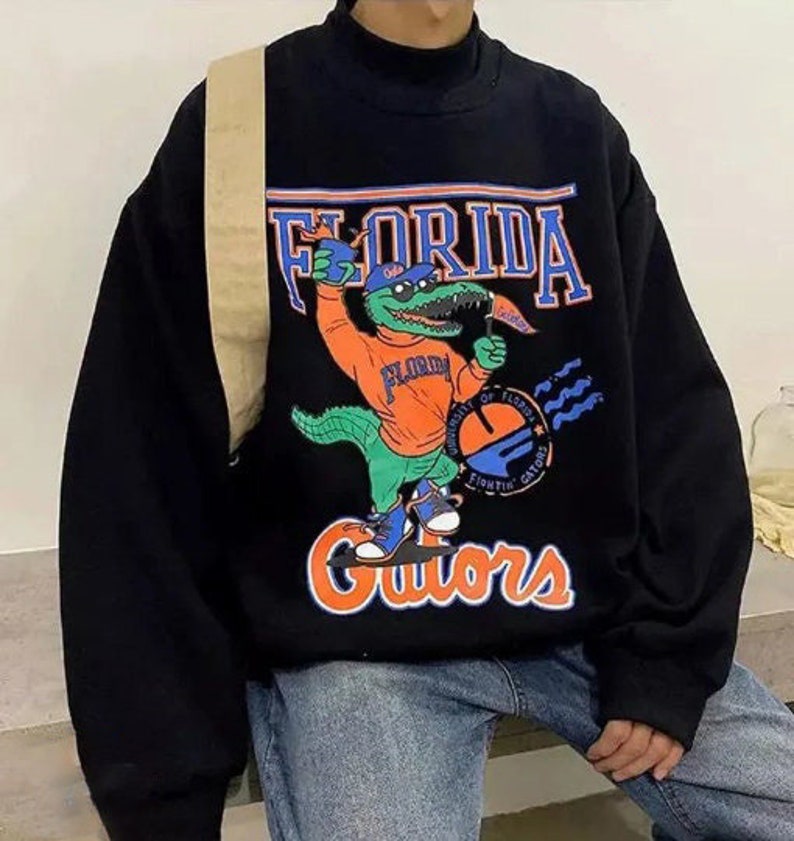 Vintage NCAA Florida Gators Logo Mascot Sweatshirt, University of Florida, College Vintage Shirt, Unisex T-shirt Sweater Hoodie Gifts for Fans - Image 2