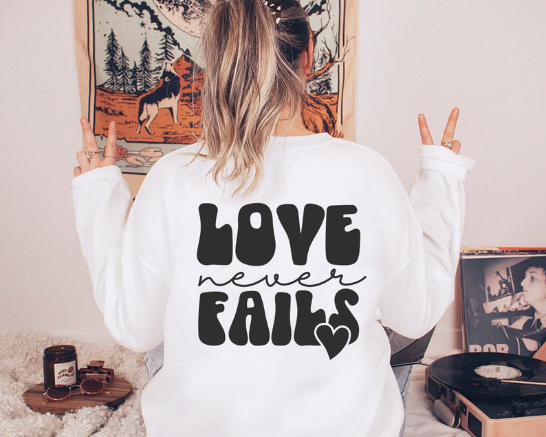Love Never Fails Christian T-Shirt with Inspirational Quote
