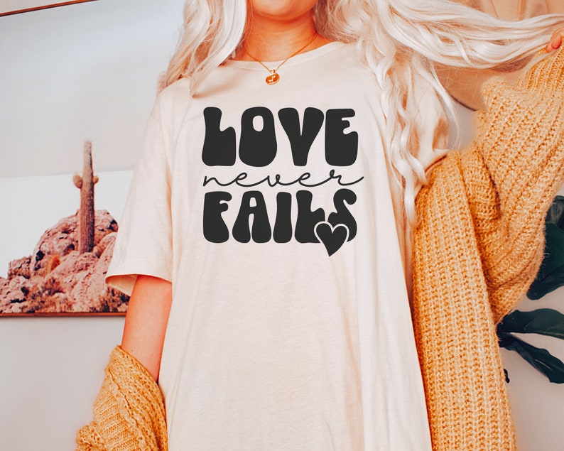 Love Never Fails Christian T-Shirt with Inspirational Quote - Image 2