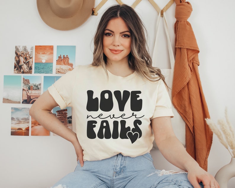 Love Never Fails Christian T-Shirt with Inspirational Quote - Image 3