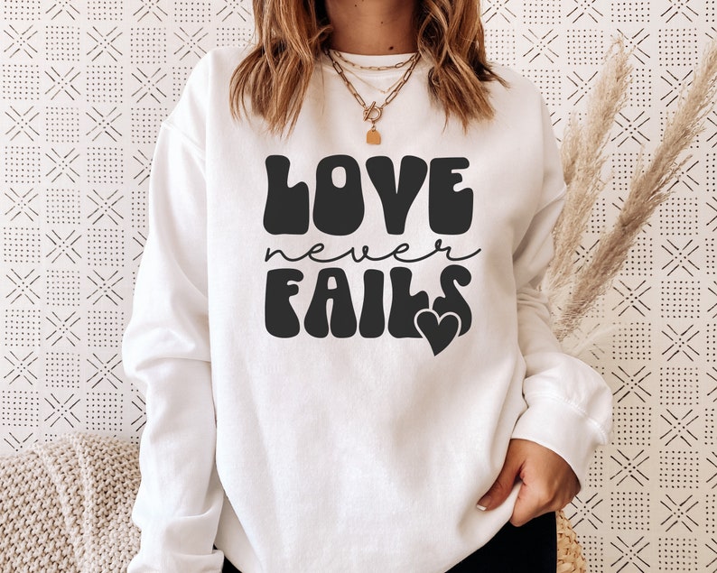 Love Never Fails Christian T-Shirt with Inspirational Quote - Image 4