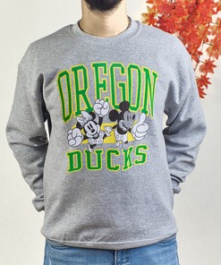 Mikey and Minnie Mouse Jumping with Oregon Ducks T-Shirt - Gift for Fans