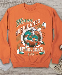 Vintage 1991 Miami Hurricanes NCAA Champs T-Shirt, Sweatshirt - Football Fanatics Logo