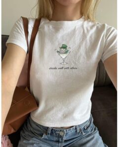 St. Patrick's Day Baby Tee for Women - Leprechaun Martini Cocktail Shirt with a Fun Twist
